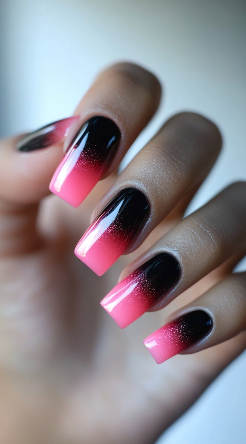 Square-shaped nails with a smooth black-to-pink ombre and high-gloss finish.